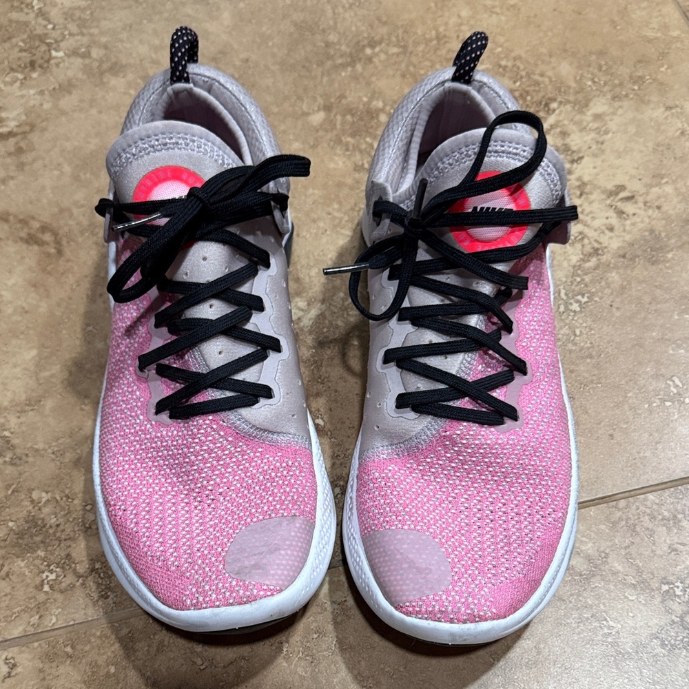 Nike Women's Joy Ride Pink and Gray Athletic Shoes